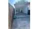 Back patio with a concrete surface surrounded by a wooden fence, offering a private outdoor area at 712 Donner St, Las Vegas, NV 89107