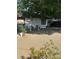 Landscaped front yard with mature tree providing lots of shade to the home at 712 Donner St, Las Vegas, NV 89107