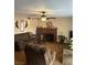 Spacious living room featuring brick fireplace and plush, comfortable furniture at 712 Donner St, Las Vegas, NV 89107