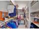 Well-organized walk-in closet with ample shelving, hanging space, and custom storage solutions at 794 Sunny Sagebrush St, Henderson, NV 89011