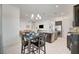 Bright dining area adjacent to the kitchen and living room, perfect for Gathering meals and gatherings at 794 Sunny Sagebrush St, Henderson, NV 89011