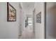 Bright hallway featuring decor leading to an outdoor patio with light tile flooring at 794 Sunny Sagebrush St, Henderson, NV 89011