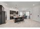 Bright kitchen with stainless steel appliances, granite countertops, and a breakfast bar at 794 Sunny Sagebrush St, Henderson, NV 89011