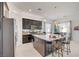 Modern kitchen featuring granite countertops, stainless steel appliances, and ample cabinet space at 794 Sunny Sagebrush St, Henderson, NV 89011