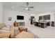 Spacious open-concept living room flows seamlessly into a modern kitchen with updated appliances at 794 Sunny Sagebrush St, Henderson, NV 89011