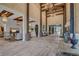 Spacious lobby featuring high ceilings, wooden beams, decorative lighting and comfortable seating areas at 794 Sunny Sagebrush St, Henderson, NV 89011