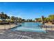 Large, pristine pool surrounded by mature trees and comfortable lounge chairs, perfect for relaxation at 794 Sunny Sagebrush St, Henderson, NV 89011