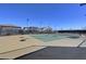 Well-maintained tennis court in a community featuring a net and new lighting at 794 Sunny Sagebrush St, Henderson, NV 89011