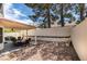 Spacious backyard featuring a covered patio and low-maintenance gravel landscaping at 8021 Hilliard Ave, Las Vegas, NV 89128