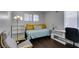 Cozy bedroom with twin bed, built-in shelves, and desk at 8021 Hilliard Ave, Las Vegas, NV 89128