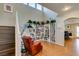 Stylish living room showcases high ceilings, a bookshelf, and an adjacent dining area at 8021 Hilliard Ave, Las Vegas, NV 89128