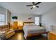 Relaxing main bedroom with neutral tones, wood floors and abundant natural light at 8021 Hilliard Ave, Las Vegas, NV 89128