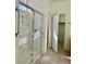 This bathroom features a glass shower and a walk-in closet, offering both style and functionality at 8900 Big Bear Pines Ave, Las Vegas, NV 89143