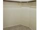 Walk-in closet with neutral walls and shelving ready for organization at 8900 Big Bear Pines Ave, Las Vegas, NV 89143