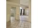 Open living room featuring tile floors, high ceilings and natural light at 8900 Big Bear Pines Ave, Las Vegas, NV 89143