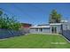 Backyard with a grass lawn, perfect for outdoor activities at 920 Biltmore Dr, Las Vegas, NV 89101