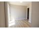 Bright bedroom with a sliding glass door that opens to an outdoor space at 920 Biltmore Dr, Las Vegas, NV 89101