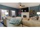 Inviting living room featuring a fireplace, a large TV, and comfortable seating at 920 Biltmore Dr, Las Vegas, NV 89101