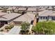 Beautiful aerial view of a single-story home with desert landscaping, a two-car garage, and a well-maintained yard at 9288 Valley Betica Ave, Las Vegas, NV 89148
