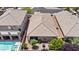 Home with tile roof, small yard, and a community with well-maintained landscaping at 9288 Valley Betica Ave, Las Vegas, NV 89148