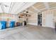 Spacious two car garage with shelving, water softener, and ample storage space at 9288 Valley Betica Ave, Las Vegas, NV 89148