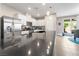 Well-appointed kitchen features stainless steel appliances, granite countertops, and lots of storage space at 9288 Valley Betica Ave, Las Vegas, NV 89148