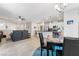 Bright, open-concept living space with kitchen and dining area at 9288 Valley Betica Ave, Las Vegas, NV 89148
