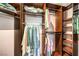 Walk-in closet with custom wood organizers providing ample storage space at 979 Coatbridge St, Las Vegas, NV 89145