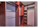 Large, organized closet with wood shelving and plenty of hanging space at 979 Coatbridge St, Las Vegas, NV 89145