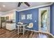 Charming dining area with hardwood floors, a ceiling fan, and sliding glass door at 979 Coatbridge St, Las Vegas, NV 89145