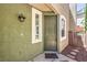 Close-up of a modern front door with decorative windows, exterior lighting, and stone pathway at 979 Coatbridge St, Las Vegas, NV 89145