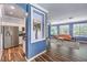 Open-concept living room with hardwood floors and niche detail at 979 Coatbridge St, Las Vegas, NV 89145