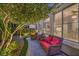 Outdoor patio area complete with decorative landscaping, accent lighting, and comfortable seating at 979 Coatbridge St, Las Vegas, NV 89145