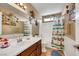 Bright bathroom with turtle accents, walk-in shower, and modern vanity at 1068 African Eagle Ave, Henderson, NV 89015