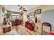 Bedroom featuring wood floors, a desk, and natural lighting at 1068 African Eagle Ave, Henderson, NV 89015