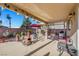 A covered patio area equipped with outdoor furniture, perfect for entertaining or relaxation at 1068 African Eagle Ave, Henderson, NV 89015