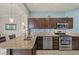 Modern kitchen with granite countertops and stainless steel appliances, perfect for cooking at 10921 Grand Haven Ave, Las Vegas, NV 89134