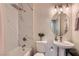 Updated bathroom featuring a shower-tub combo with modern fixtures and a stylish vanity at 11074 Caramel Crest Ct, Las Vegas, NV 89135