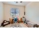Bright room with desk and chair, featuring a window for natural light at 11074 Caramel Crest Ct, Las Vegas, NV 89135