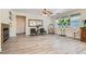 Bright living room featuring a fireplace, stylish seating, and lots of natural light at 11074 Caramel Crest Ct, Las Vegas, NV 89135