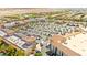 Overhead view of shopping area with ample parking, retail outlets, and convenient access for residents at 11649 Royal Derwent Dr, Las Vegas, NV 89138