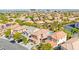 Stunning aerial shot showcases the neighborhood's serene atmosphere with well-manicured lawns and beautiful home exteriors at 11649 Royal Derwent Dr, Las Vegas, NV 89138