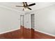 Bedroom featuring hardwood floors, natural light, and neutral walls at 11649 Royal Derwent Dr, Las Vegas, NV 89138