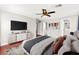 Cozy bedroom with a ceiling fan and ample closet space at 11649 Royal Derwent Dr, Las Vegas, NV 89138