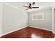 Bedroom with hardwood floors and a ceiling fan at 11649 Royal Derwent Dr, Las Vegas, NV 89138