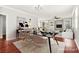 Elegant dining room with stylish decor and a view into the living space at 11649 Royal Derwent Dr, Las Vegas, NV 89138