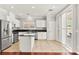 Modern kitchen with stainless steel appliances and marble countertops at 11649 Royal Derwent Dr, Las Vegas, NV 89138