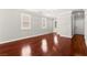 Bright living room with wood floors and ample natural light at 11649 Royal Derwent Dr, Las Vegas, NV 89138