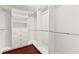 Spacious walk-in closet featuring custom shelving, drawers, and ample hanging space at 11649 Royal Derwent Dr, Las Vegas, NV 89138