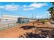 Property featuring a storage shed and enclosed with fencing; perfect for secure storage solutions at 1385 Morning Sun Way, Las Vegas, NV 89110